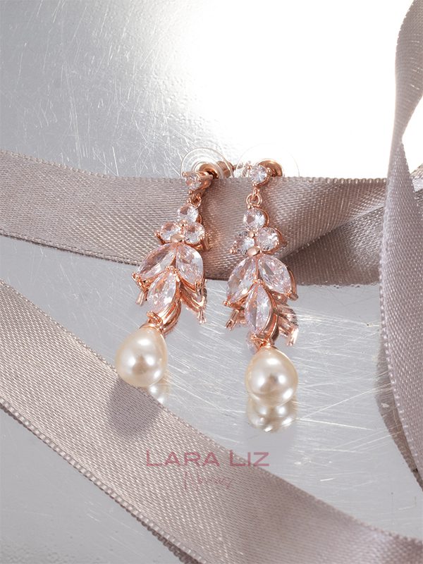 Productos 5 aretes hojas perlas